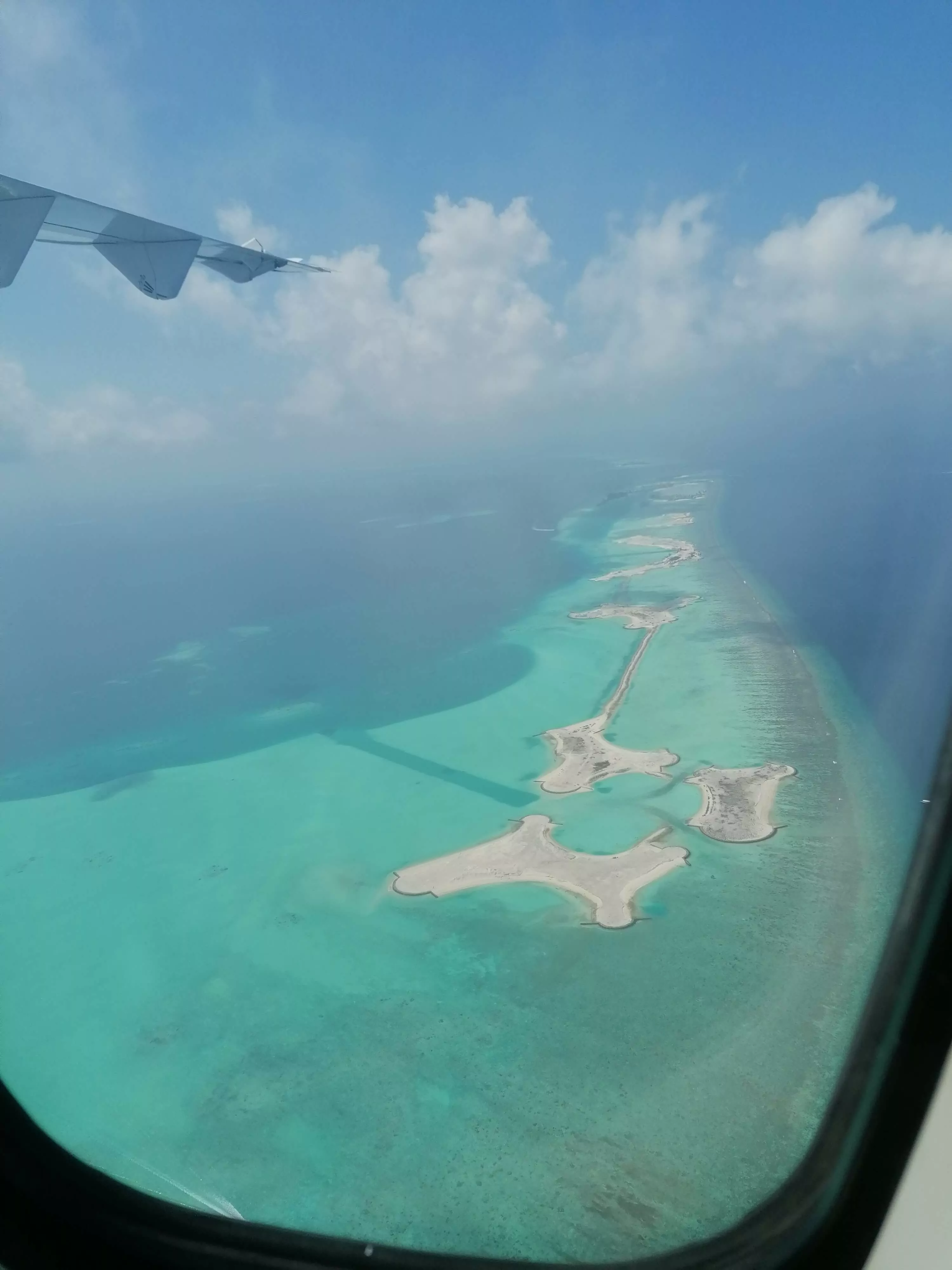 Maldives Travel Guide - view of the atolls from the domestic flights