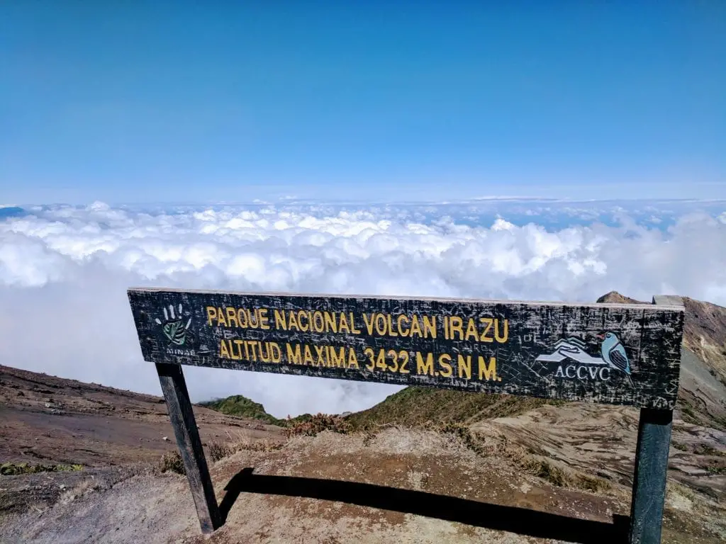 Costa Rica Itinerary - Sign on the peak of Irazu volcano above the clouds