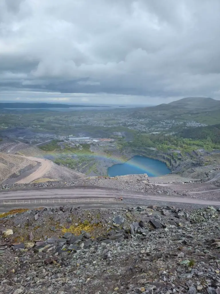 Zip World Karts - the view from the top of the quarry looking down at the blue lagoon at the bottom of the track