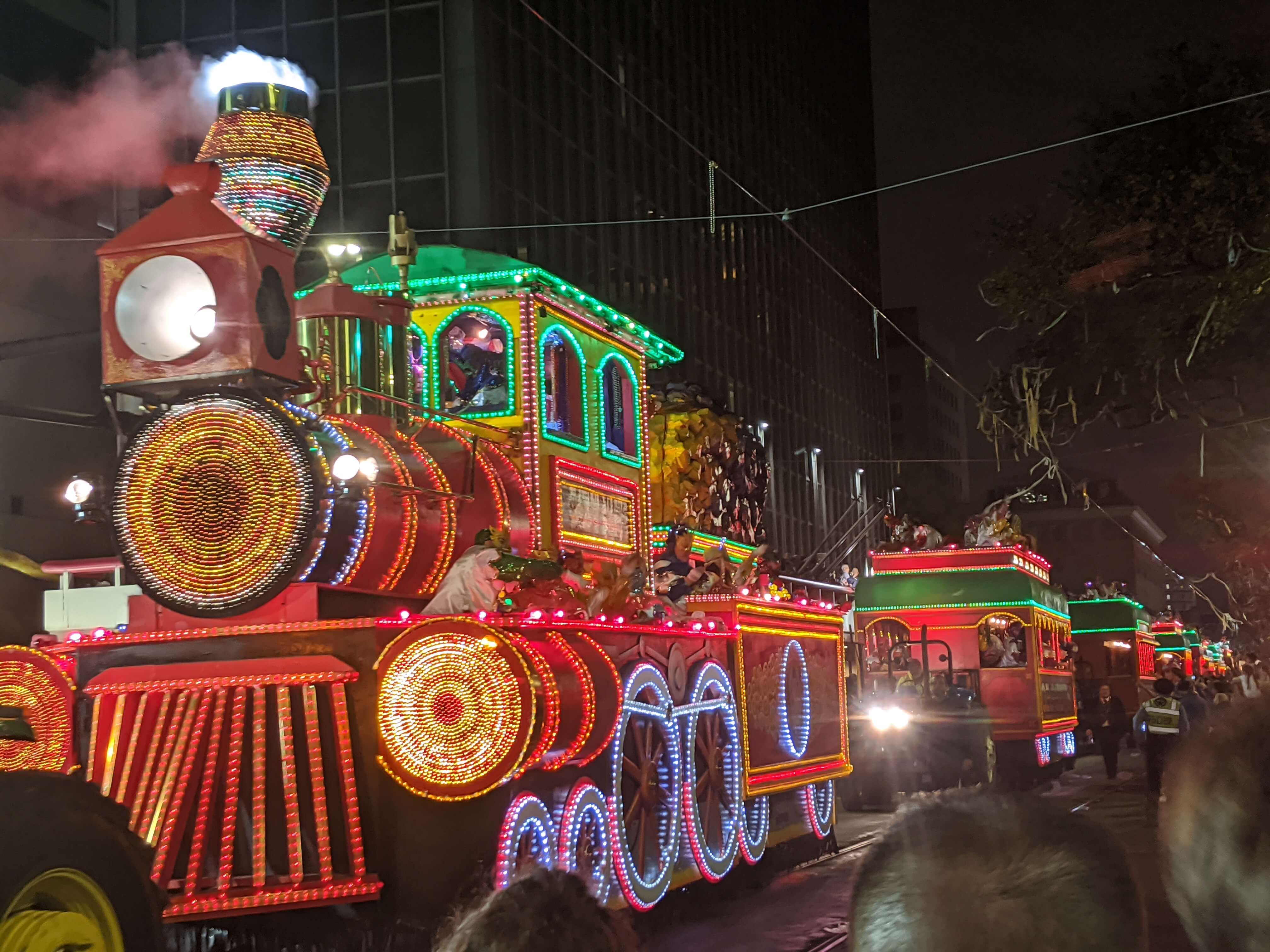 Mardi Gras Carnival New Orleans - night time krewe with lit up train
