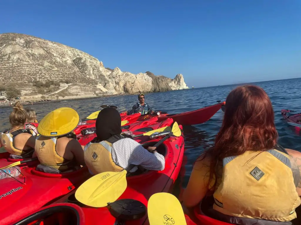 Santorini sunset kayak - white beach 