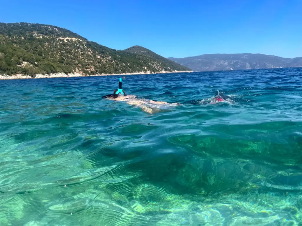 Things to do in Kefalonia - snorkeling in the turquoise waters of Antisamos Beach