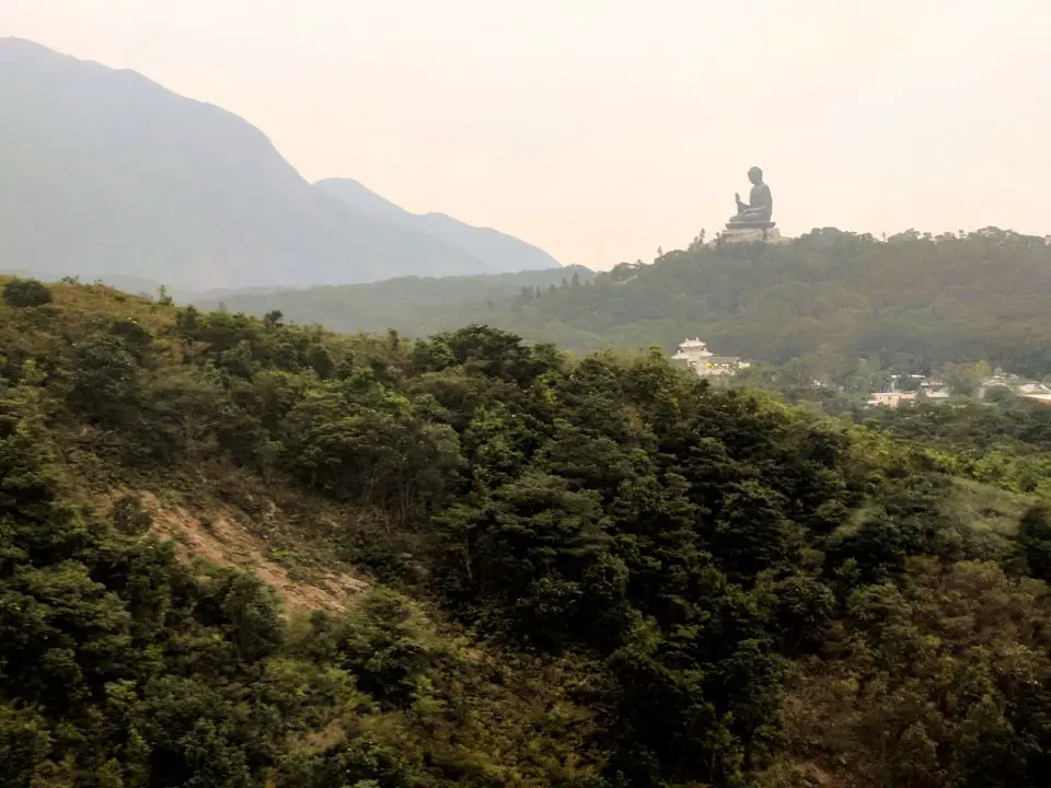 Top 10 things to do in Hong Kong for First-Time Visitors - catch a cable car to see the Big Buddha statue 
