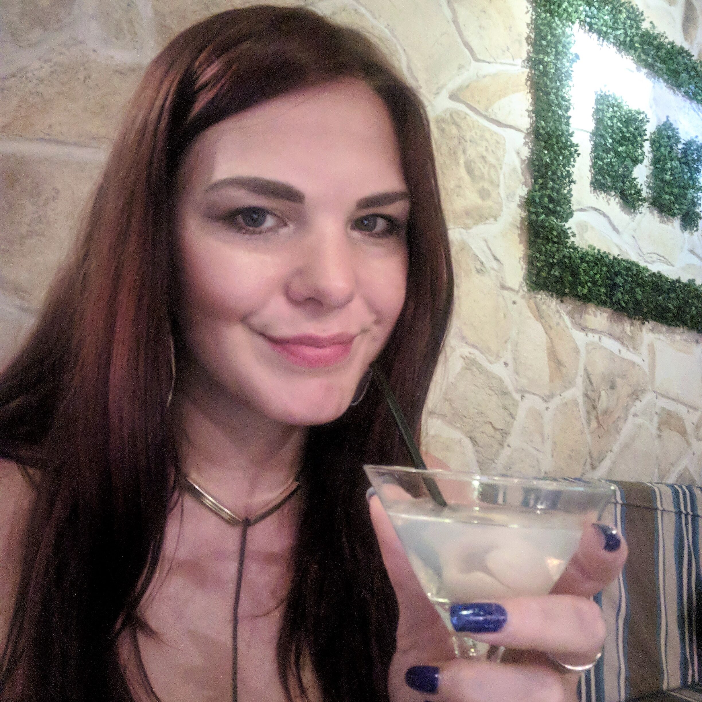 Me drinking a Lychee Martini at a cocktail bar in Bali, Indonesia 